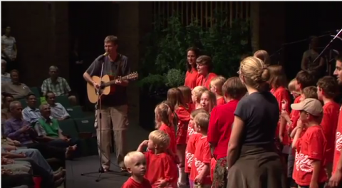 Bryan Moyer leading children in song Bryan Moyer leading children in song