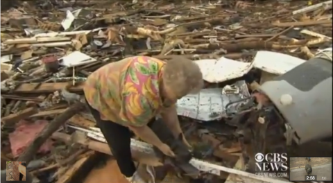 Screenshot of woman who found her dog amid tornado rubble in Moore, Okla. Screenshot of woman who found her dog amid tornado rubble in Moore, Okla.