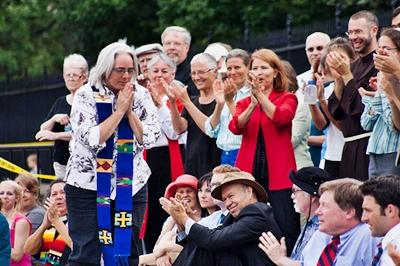 Rose Marie Berger (left with blue stole) shortly before her arrest during an anti-Keystone protest at the White House in August. Rose Marie Berger (left with blue stole) shortly before her arrest during an ant
