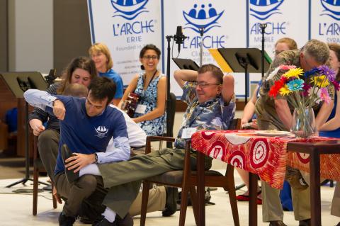 Co-chairs of L'Arche USA's inclusion team dramatize the founding of L'Arche. Image via Brian A. Taylor Photography. Co-chairs of L'Arche USA's inclusion team dramatize the founding of L'Arche. Ima