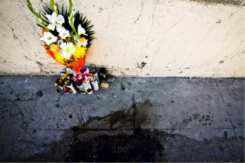 Candles near site of shooting, Murphy Woodhouse Candles near site of shooting, Murphy Woodhouse