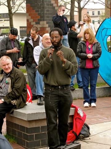 Aly Wane speaking at an event in Syracuse. Photo courtesy of Define American. Aly Wane speaking at an event in Syracuse - photo courtesy of Define American.