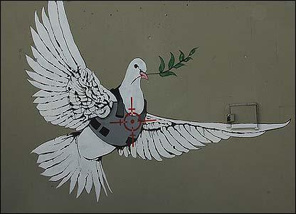 Artwork by the artist Banksy. Photo by Shane Claiborne. Artwork by the artist Banksy. Photo by Shane Claiborne.