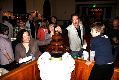 Chocolate fountain in the baptismal font at House For All, the church pastored by Nadia Bolz-Weber. Via www.houseforall.org.