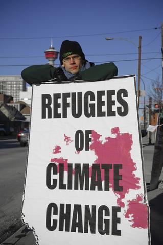 Demonstrator at a climate change rally in Calgary, Canada, 2007. Image via Wylio http://bit.ly/vZsCIN Demonstrator at a climate change rally in Calgary, Canada, 2007. Image via Wylio