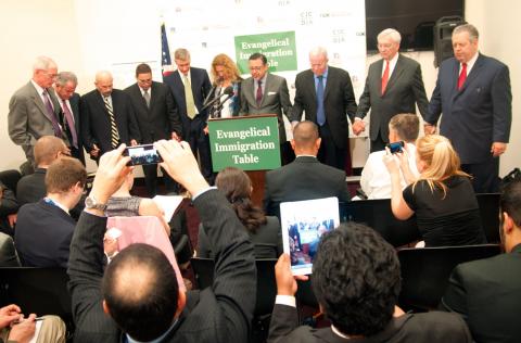 Evangelical leaders close in prayer at the Evangelical Immigration Table launch. Photo by Sandi Villarreal / Sojourners Photo by Sandi Villarreal / Sojourners