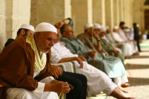 Muslims waiting for the call to prayer in Aleppo, Syria. Photo via Sadik Gulec / Shutterstock.com Photo via Sadik Gulec / Shutterstock.com