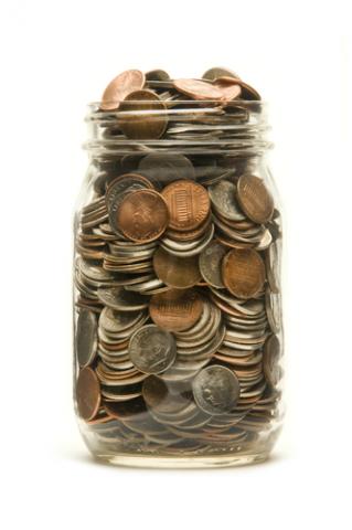 Jar of coins. Photo courtesy Balefire/shutterstock.com