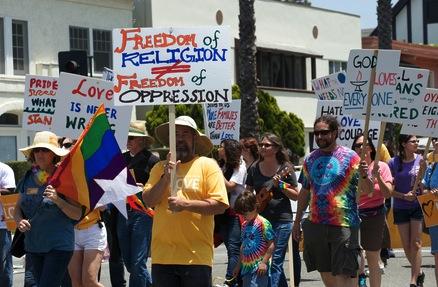 Marchers at a lesbian and gay pride parade in Long Beach, California. Photo courtesy Juan Camilo Bernal/shutterstock.com
