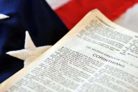 Bible and flag, JustASC / Shutterstock.com Bible and flag, JustASC / Shutterstock.com