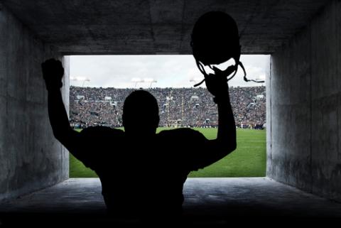 Football player in a tunnel, Brocreative / Shutterstock.com Football player in a tunnel, Brocreative / Shutterstock.com