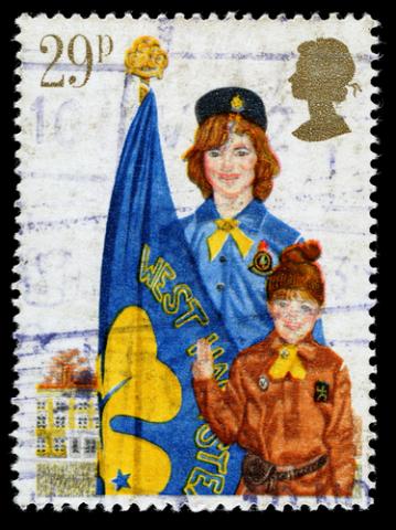 Britain organization showing the Girl Guide Movement on postal stamp. Photo courtesy Andy Lidstone/shutterstock.com. Photo courtesy Andy Lidstone/shutterstock.com.