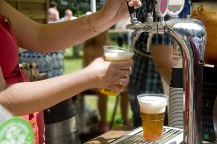 Beer being poured from a tap. Photo vai RNS/courtesy Vladimirs Koskins via Shutterstock