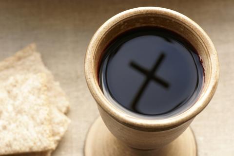 The power of the sacraments is in the faith of the individual and the grace of God. Magdalena Kucova/Shutterstock.com