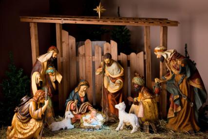 A Christmas manger scene with figurines including Jesus, Mary, Joseph, sheep and Magi. Photo courtesy Shutterstock. Via RNS.
