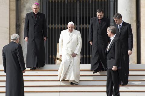 Pope Francis greets the pilgrims.