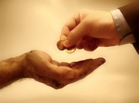 Giving money photo, Konstantinos Kokkinis / Shutterstock.com Giving money photo, Konstantinos Kokkinis / Shutterstock.com
