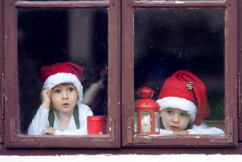 Two boys wait for Santa. Image courtesy Tomsickova Tatyana/shutterstock.com Two boys wait for Santa. Image courtesy Tomsickova Tatyana/shutterstock.com