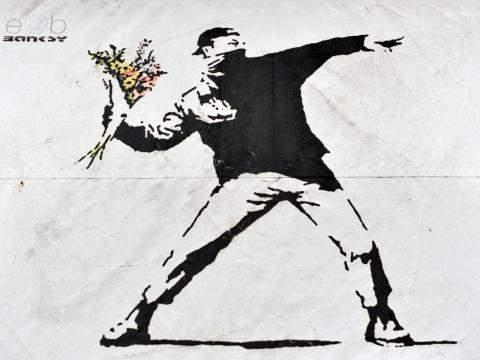 Banksy graffiti piece: 1000 Words / Shutterstock.com Banksy graffiti piece: 1000 Words / Shutterstock.com