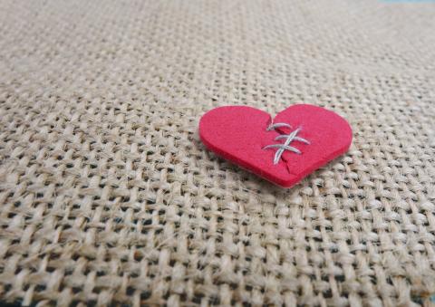 Stitched broken heart via zimmytws / Shutterstock.com