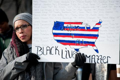 Woman holds a 'Black Lives Matter' sign. Image courtesy Rena Schild/shutterstock.com Woman holds a 'Black Lives Matter' sign. Image courtesy Rena Schild/shutterstock