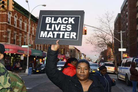Protester holds a Black Lives Matter sign in New York City. Photo via a katz / Shutterstock.com Photo via a katz / Shutterstock.com