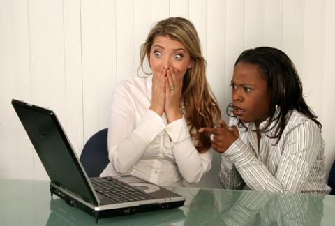 Women outraged looking at a computer screen, VanHart / Shutterstock.com Women outraged looking at a computer screen, VanHart / Shutterstock.com