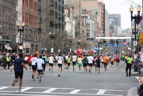 Runners cross the finish line at the Boston Marathon. Photo courtesy David Eby/shutterstock.com