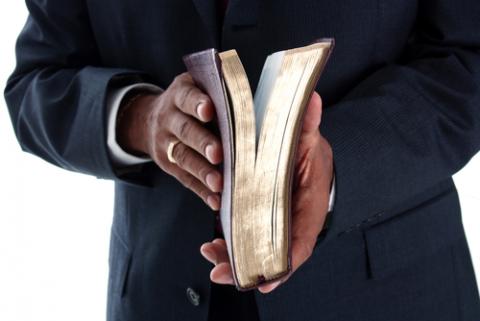 Pastor with Bible, Rob Marmion / Shutterstock.com Pastor with Bible, Rob Marmion / Shutterstock.com