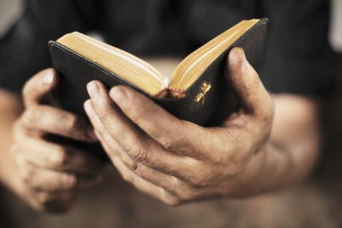 Man holding Bible photo, Stocksnapper / Shutterstock.com Man holding Bible photo, Stocksnapper / Shutterstock.com