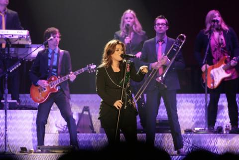 Kelly Clarkson performing in 2009. Anthony Correia / Shutterstock.com Kelly Clarkson performing in 2009. Anthony Correia / Shutterstock.com