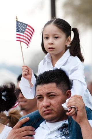 Immigrants' rights activists stand on the National Mall. Photo courtesy Ryan Rodrick Beiler/shutterstock.com
