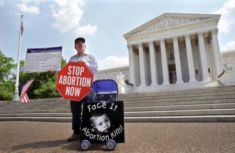 Anti-abortion protestor in front of Supreme Court, Ryan Rodrick Beiler / Shutterstock.com Ryan Rodrick Beiler / Shutterstock.com