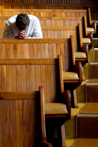 Praying image via Shutterstock Praying image via Shutterstock