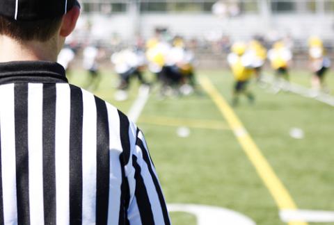 Referee on the field, Peter Kim / Shutterstock.com Referee on the field, Peter Kim / Shutterstock.com
