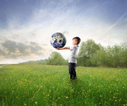Child holding the earth, olly, Shutterstock.com Child holding the earth, olly, Shutterstock.com