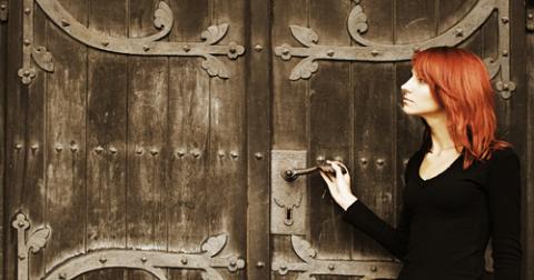 Photo: Young woman near church doors, Lisa A / Shutterstock.com Photo: Young woman near church doors, Lisa A / Shutterstock.com