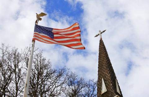 American flag and church steeple, Bobkeenan Photography / Shutterstock.com American flag and church steeple, Bobkeenan Photography / Shutterstock.com