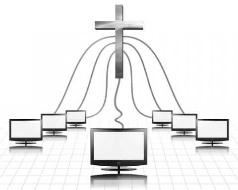 A cross plugged into computer screens. Illustration courtesy Bruce Rolff/shutterstock.com A cross plugged into computer screens. Illustration courtesy Bruce Rolff/shutter