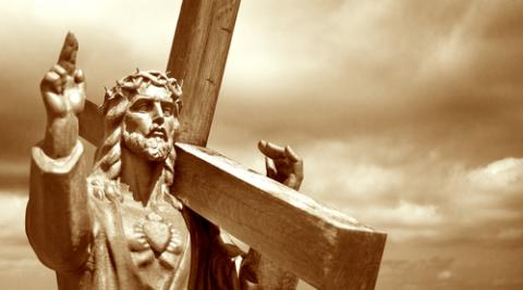 Jesus holding the cross, Kobets / Shutterstock.com Jesus holding the cross, Kobets / Shutterstock.com