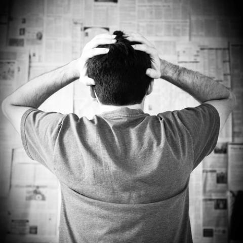 Man overwhelmed by bad news, Joyce Vincent / Shutterstock.com Man overwhelmed by bad news, Joyce Vincent / Shutterstock.com
