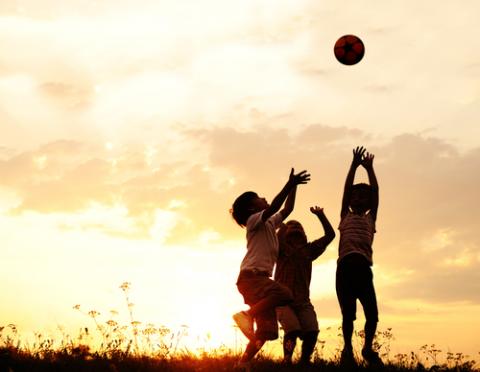 Children playing with a ball at sunset. Image courtesy Zurijeta/shutterstock.com Children playing with a ball at sunset. Image courtesy Zurijeta/shutterstock.com