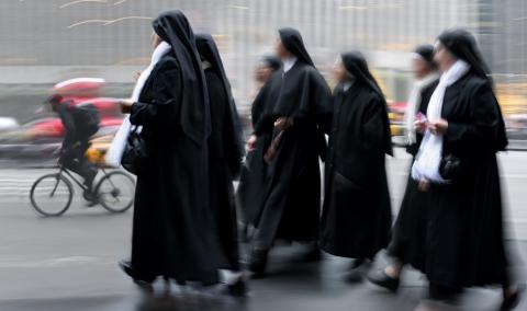 Group of a nuns walking, SVLuma/Shutterstock.com Group of a nuns walking, SVLuma/Shutterstock.com