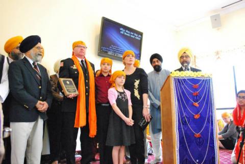 Brian Murphy, second from left, was honored by the Guru Gobind Singh Foundation. Photo courtesy of Rajinder Babra, via RNS