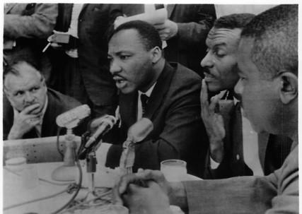 Rev. Martin Luther King Jr. and associates call a temporary halt to mass demonstrations in 1963. Religion News Service filephoto