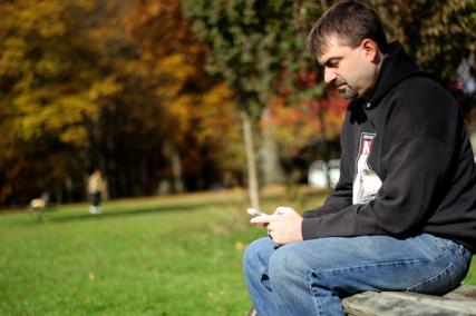 Tom Amon, a 37-year-old atheist, opens his YouVersion app nightly to engage believers. RNS photo by Beatriz Wallace.