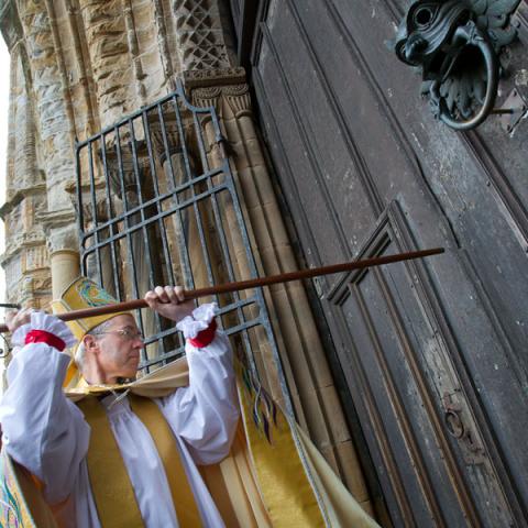 Bishop Justin Welby knocks at the doors of Durham Cathedral during his installation ceremony RNS photo courtesy Durham Cathedral RNS photo courtesy Durham Cathedral