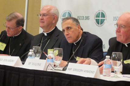 Archbishop Joseph E. Kurtz (center left) of Louisville, Ky. RNS photo by David Gibson