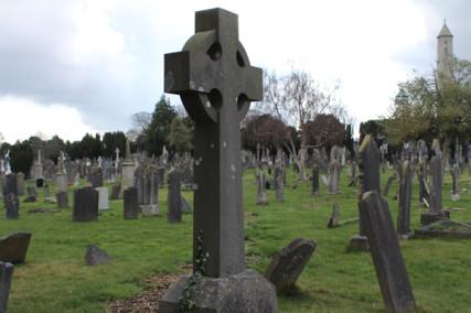 A Patrician cross, Ireland’s dominant religious symbols, marks a burial at Dublin’s Glasnevin Cemetery. Photo by Paresh Dave Photo by Paresh Dave