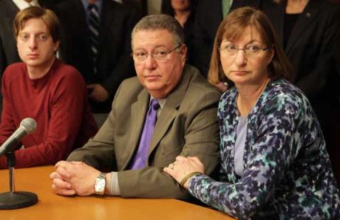 Joseph and Jane Clementi, parents of Tyler Clementi; (right); and their son, James; are seen during a press conference Joseph and Jane Clementi, parents of Tyler Clementi and their son, James